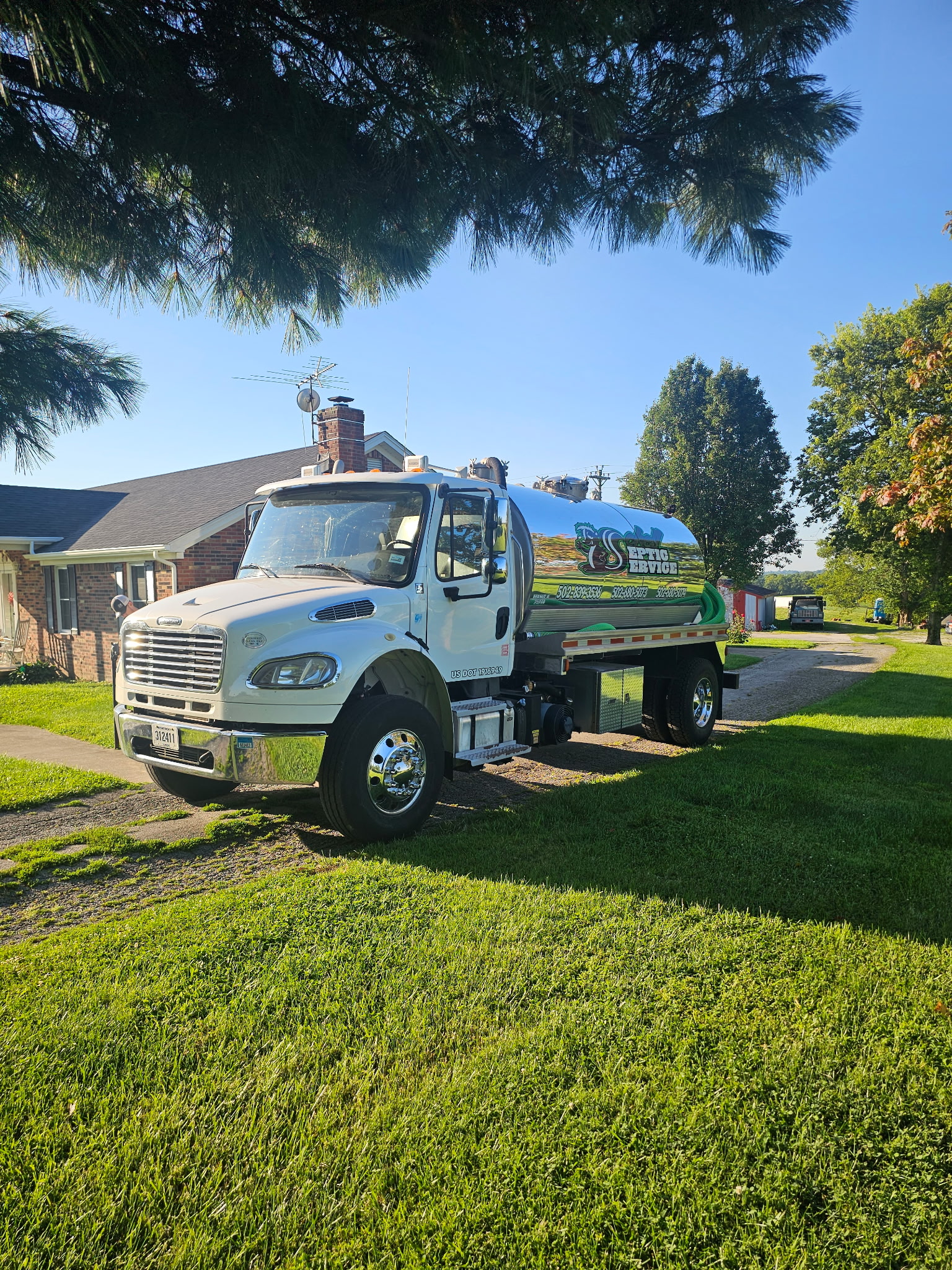 Schell Septic Service field work with professional vacuum equipment