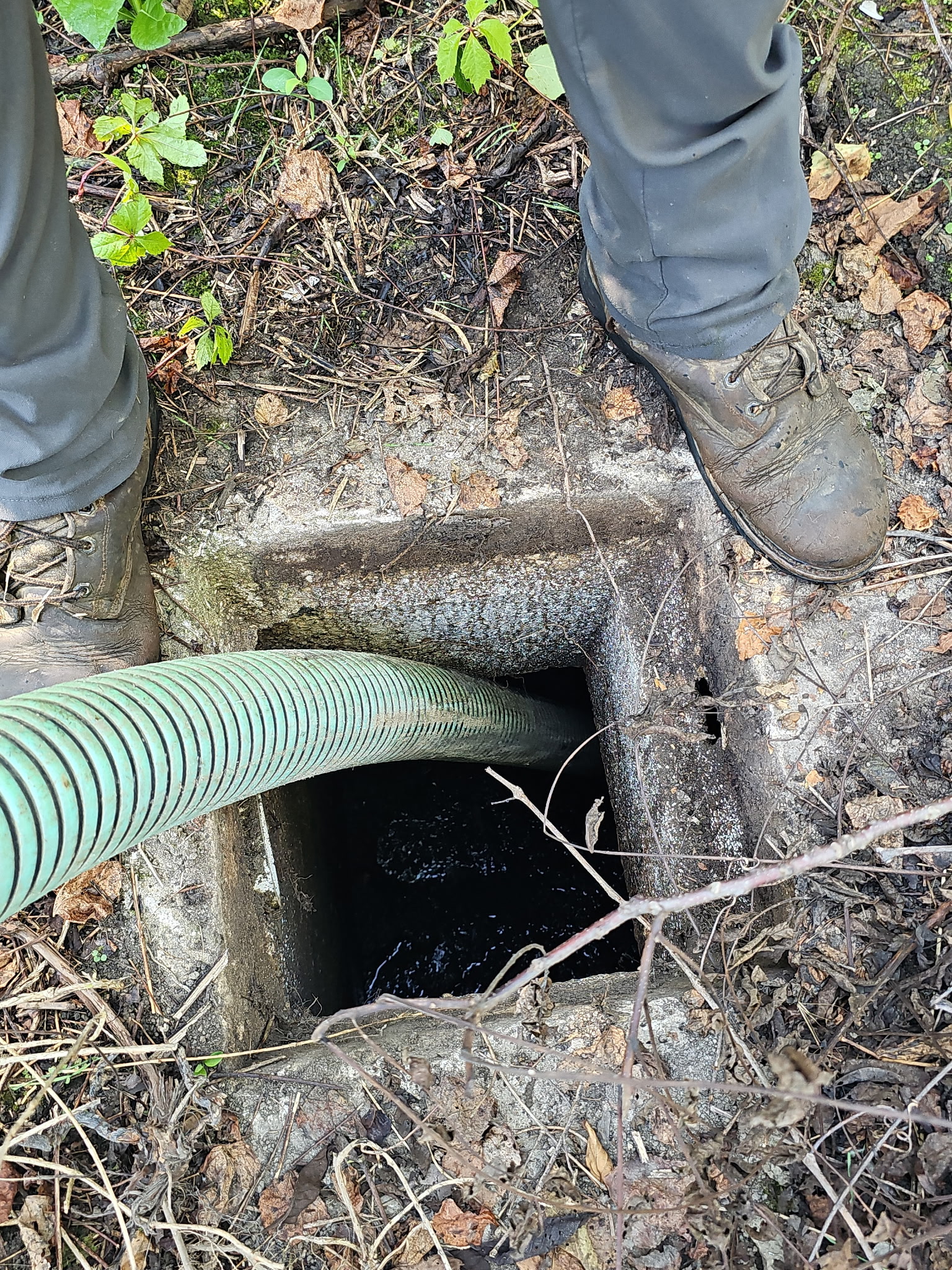 Schell Septic Service crew and equipment at a Lawrenceburg area job